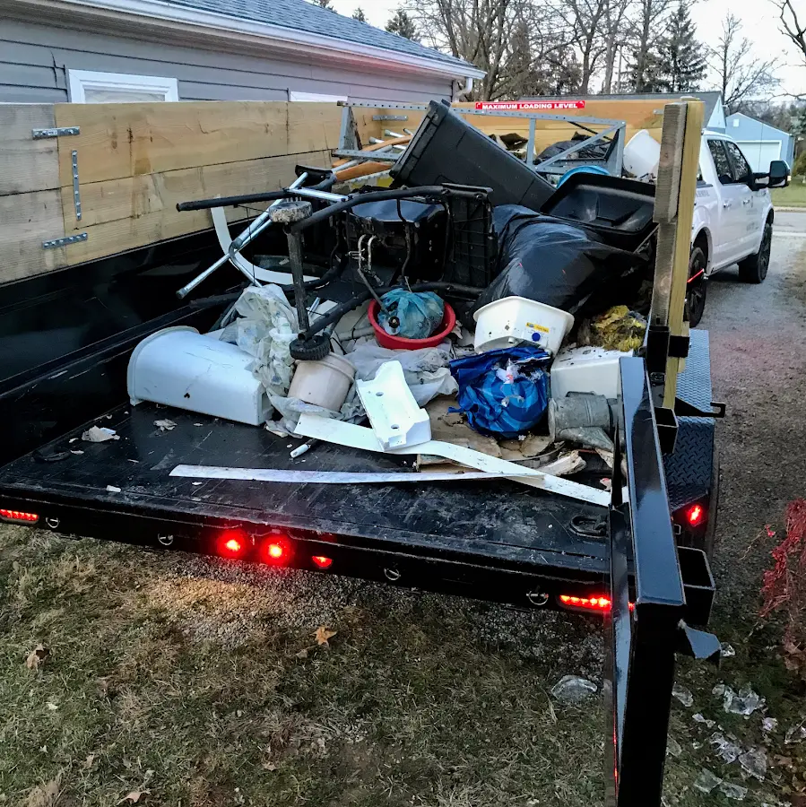 Roll-off dumpster delivered to a residential driveway in Quantico Base