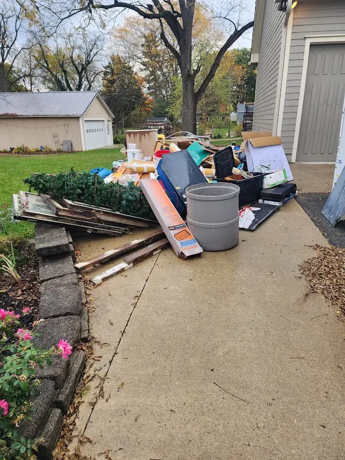 Dumpster being loaded with debris for 30 Yard Dumpster Rental in Quantico Base